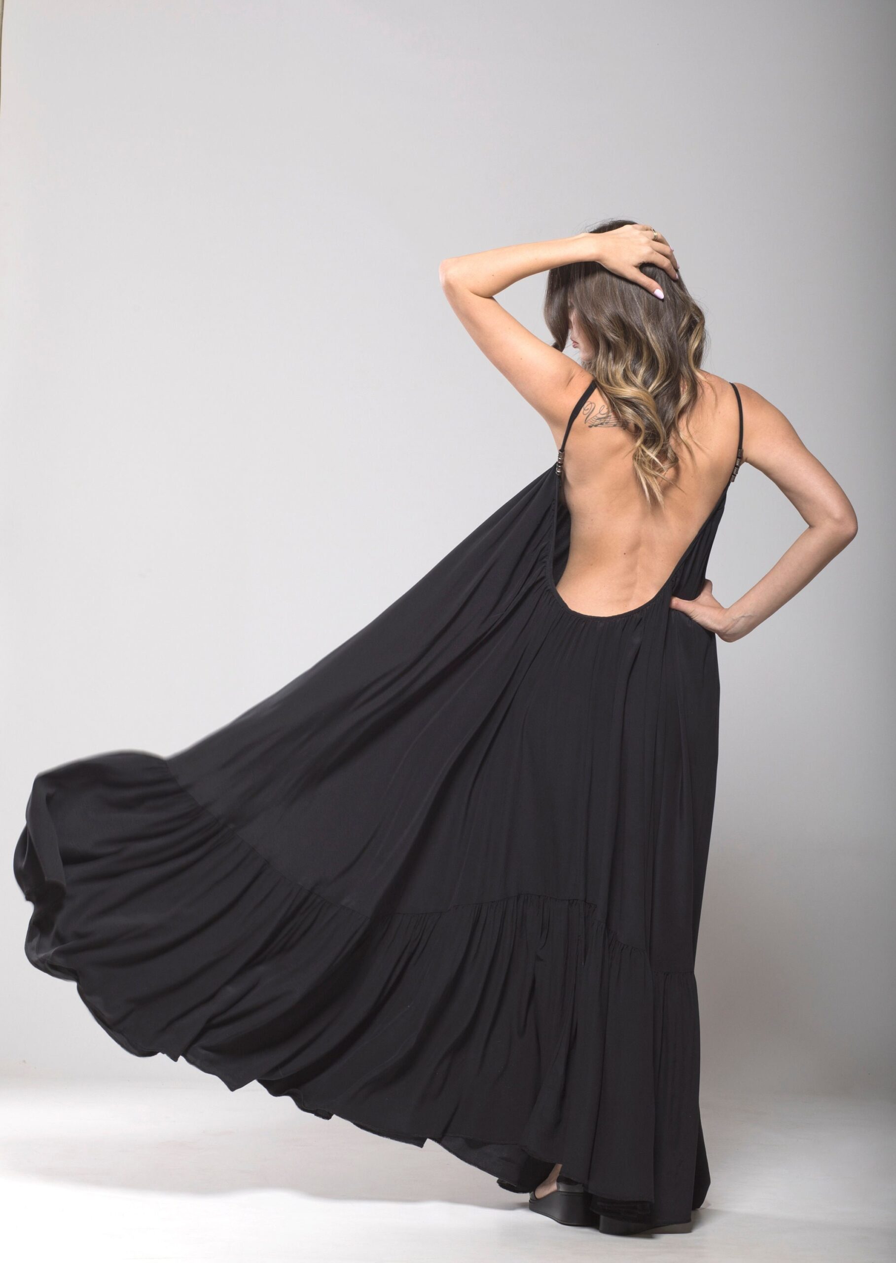 Illustrative example of backless dresses maxi