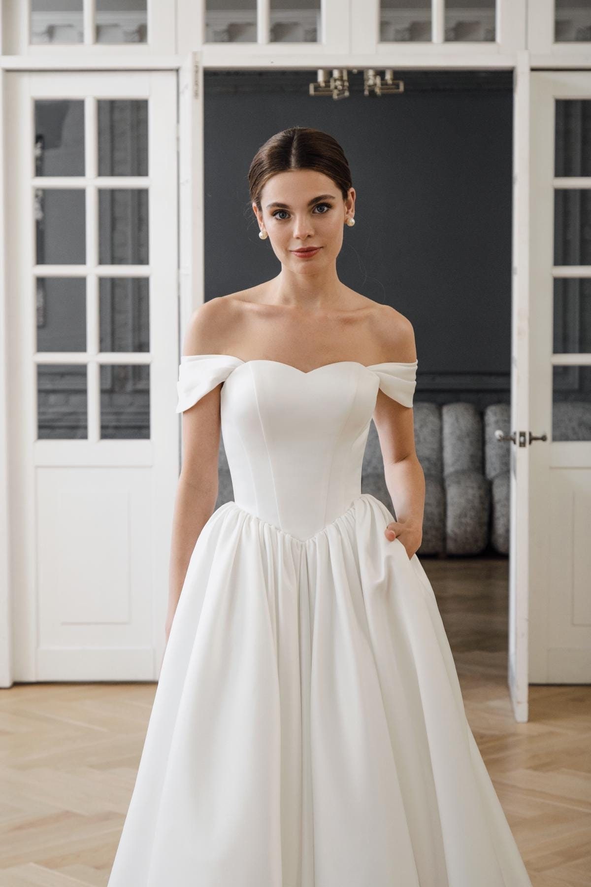 Illustrative example of basque waist wedding dress