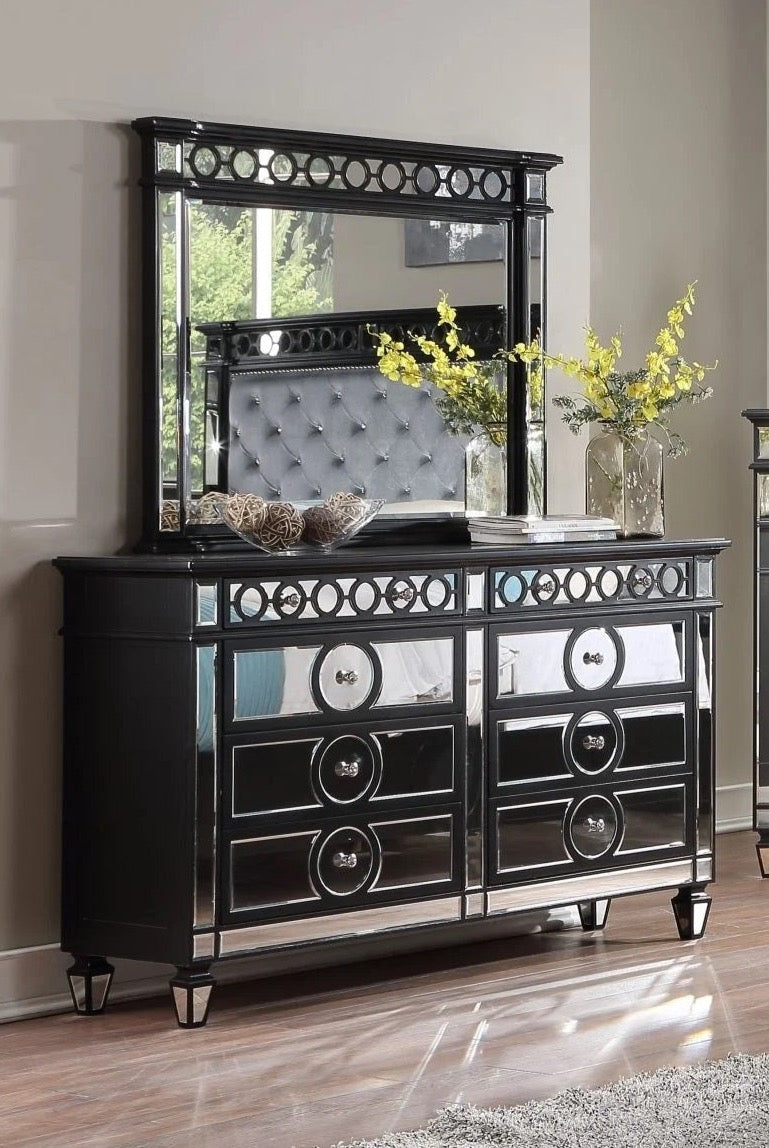 Illustrative example of black dresser with mirror
