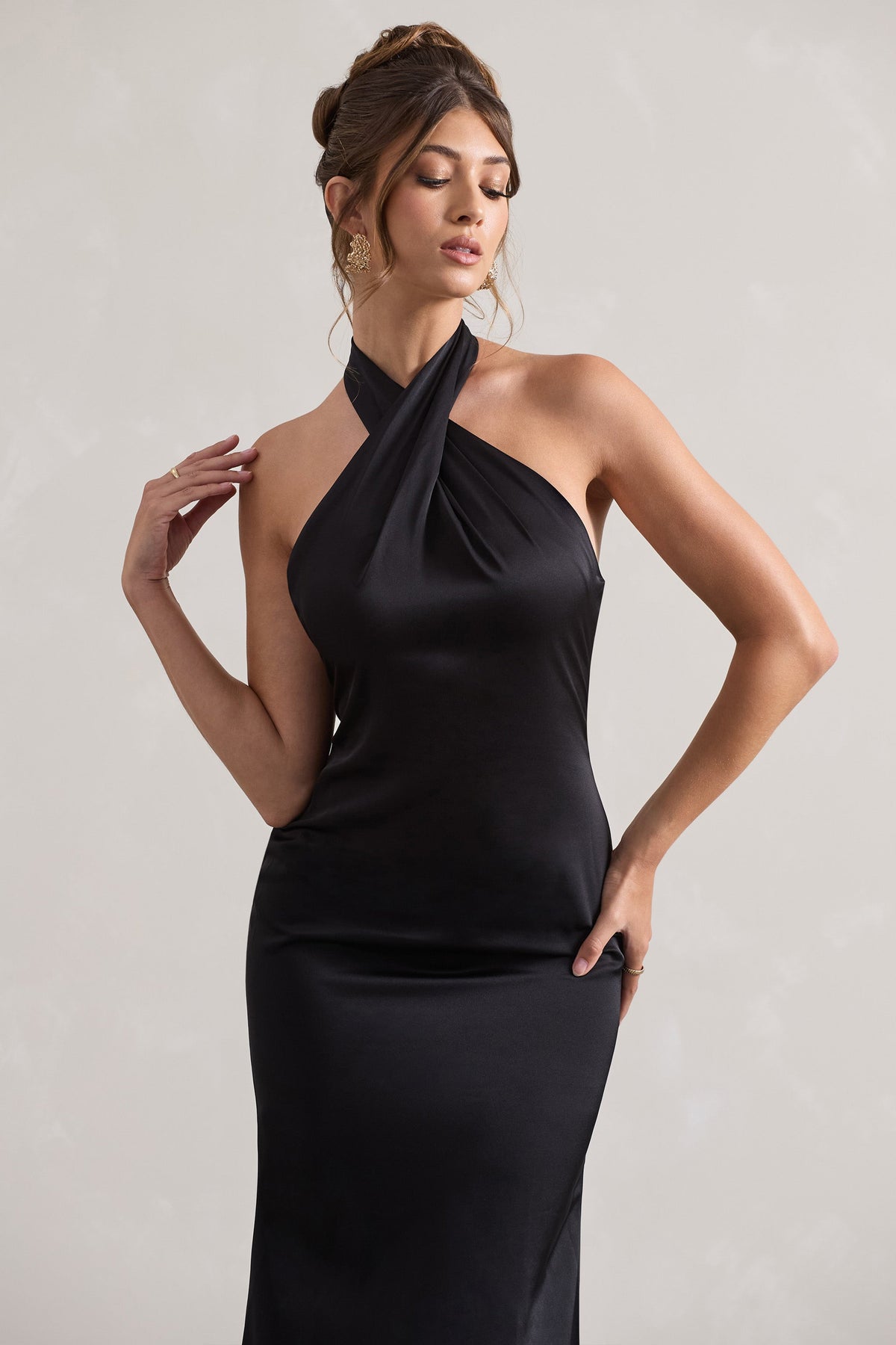 Illustrative example of black halter neck dress