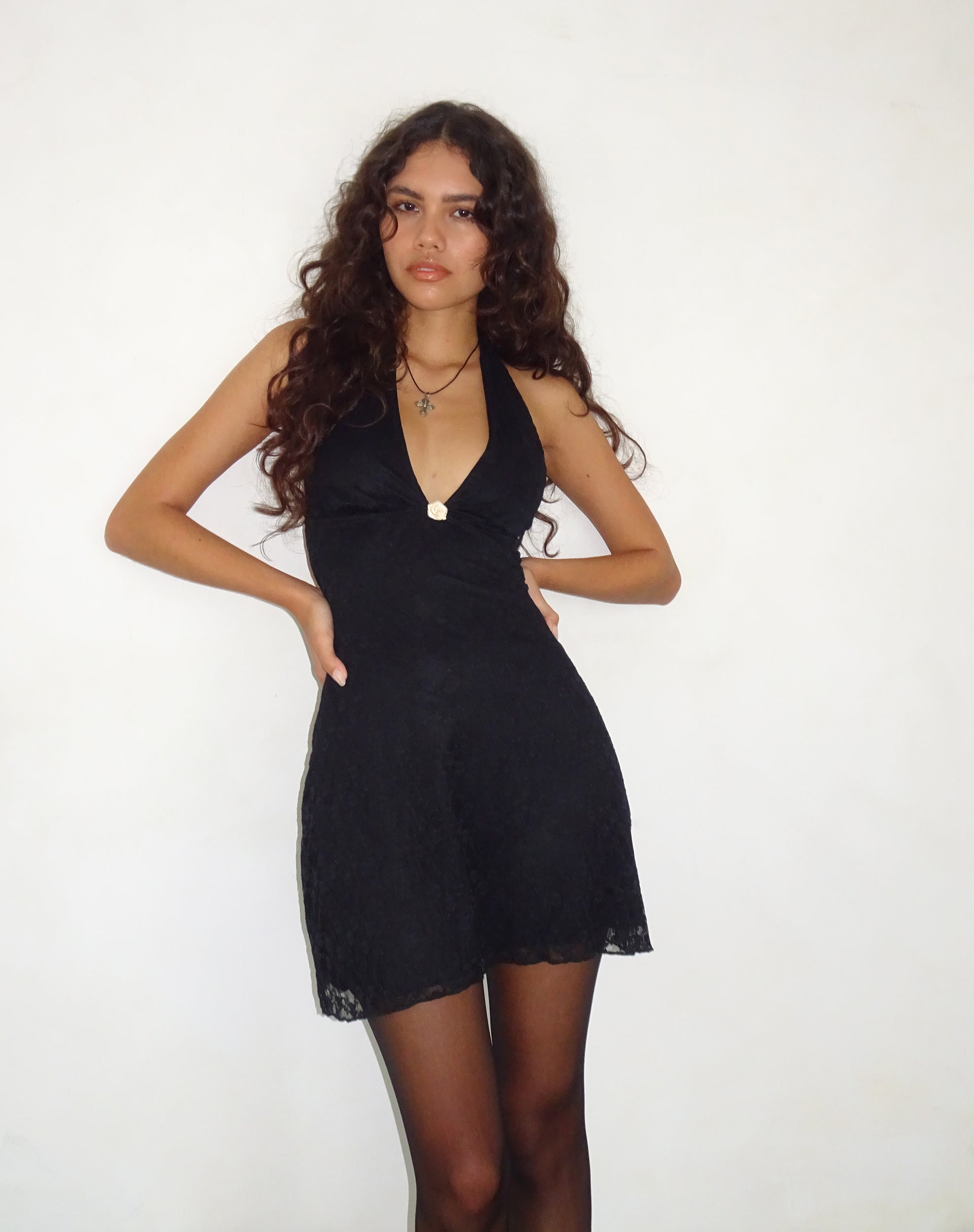 Illustrative example of black lace mini dress