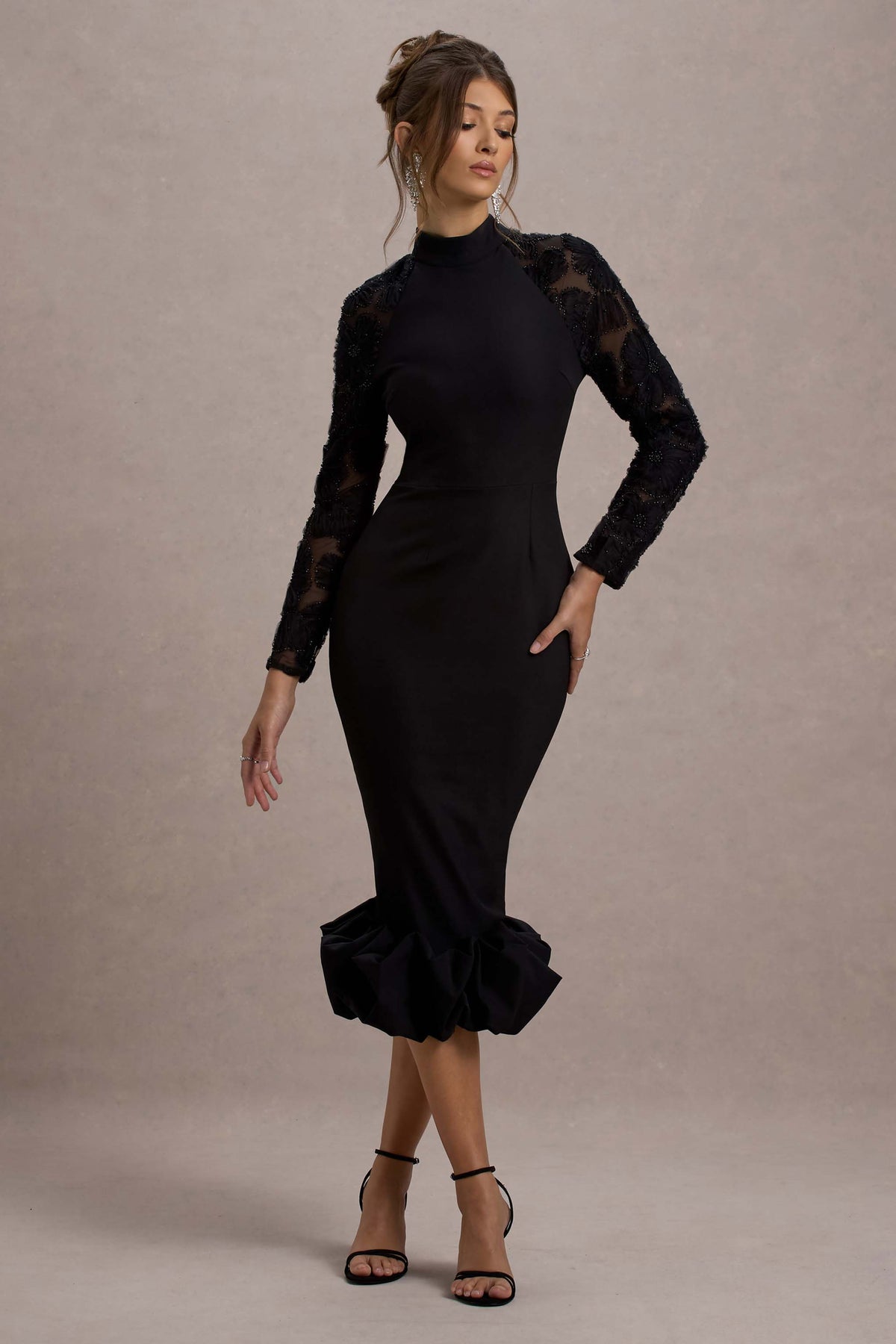 Illustrative example of black midi dress with sleeves