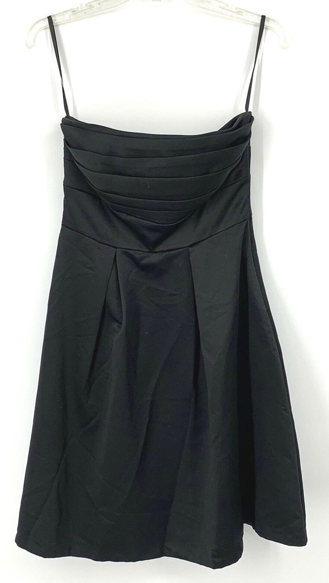 Illustrative example of black spaghetti strap dress