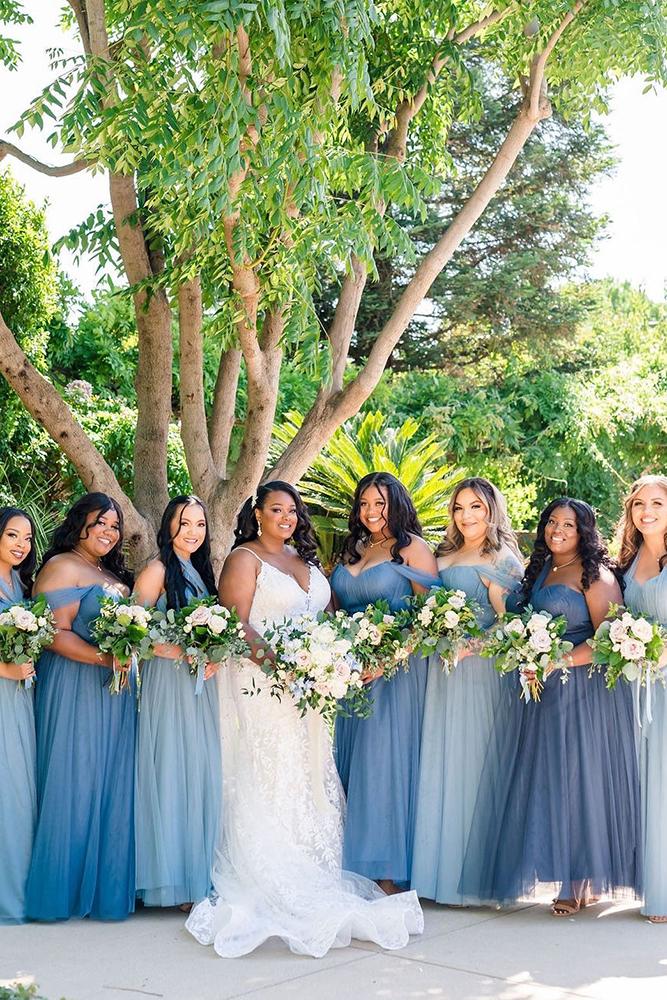 Illustrative example of blue bridesmaid dresses flowers