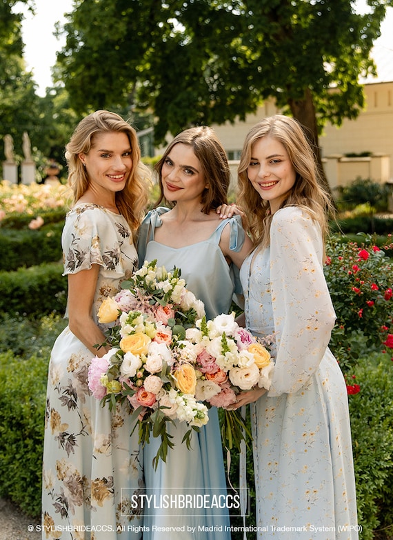Illustrative example of blue bridesmaid dresses flowers