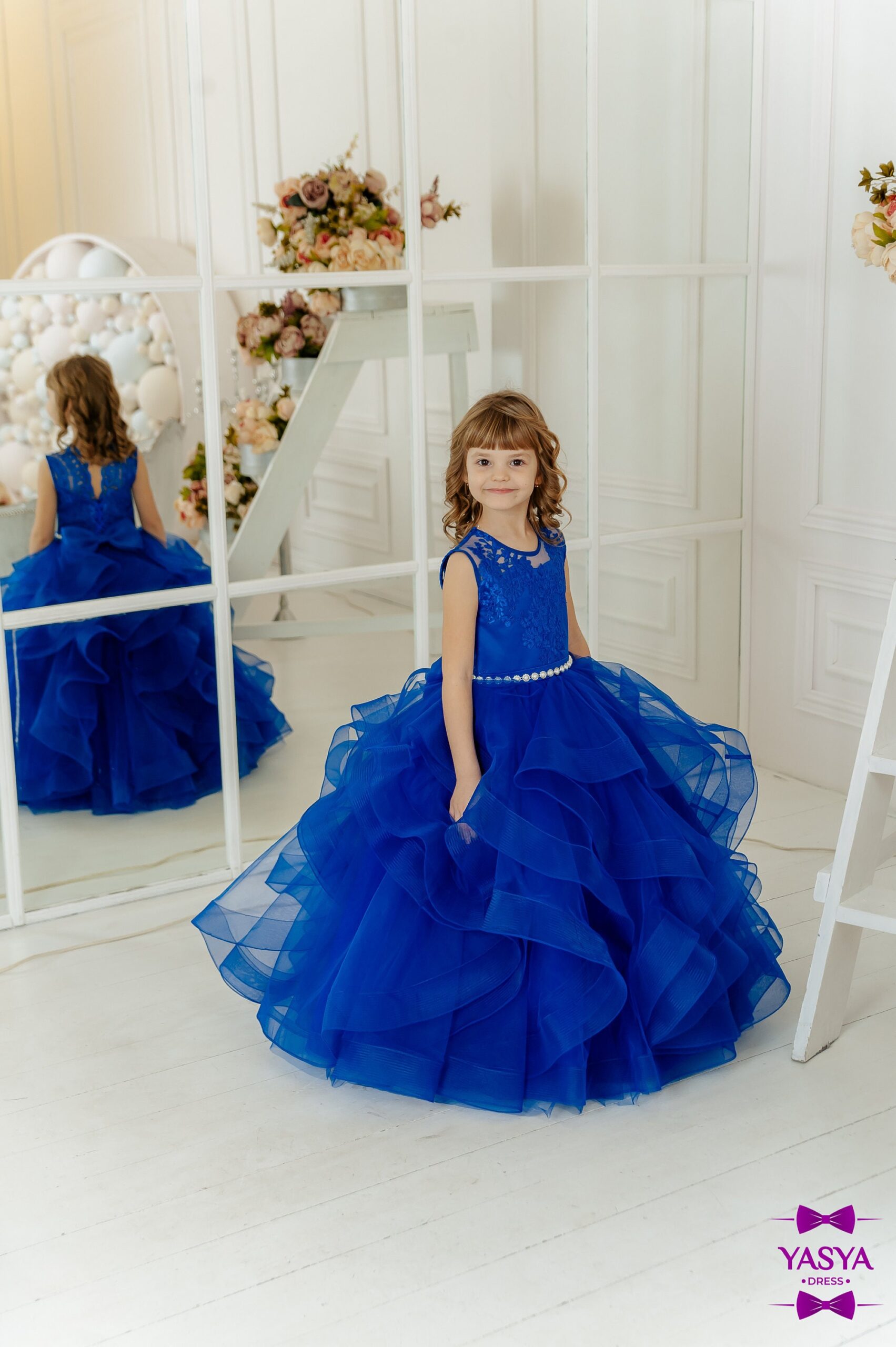 Illustrative example of blue flower girl dresses