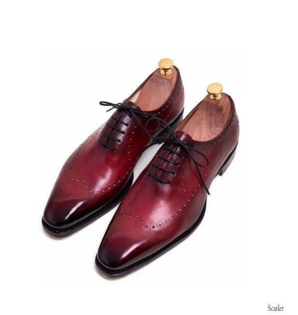 Illustrative example of burgundy dress shoes