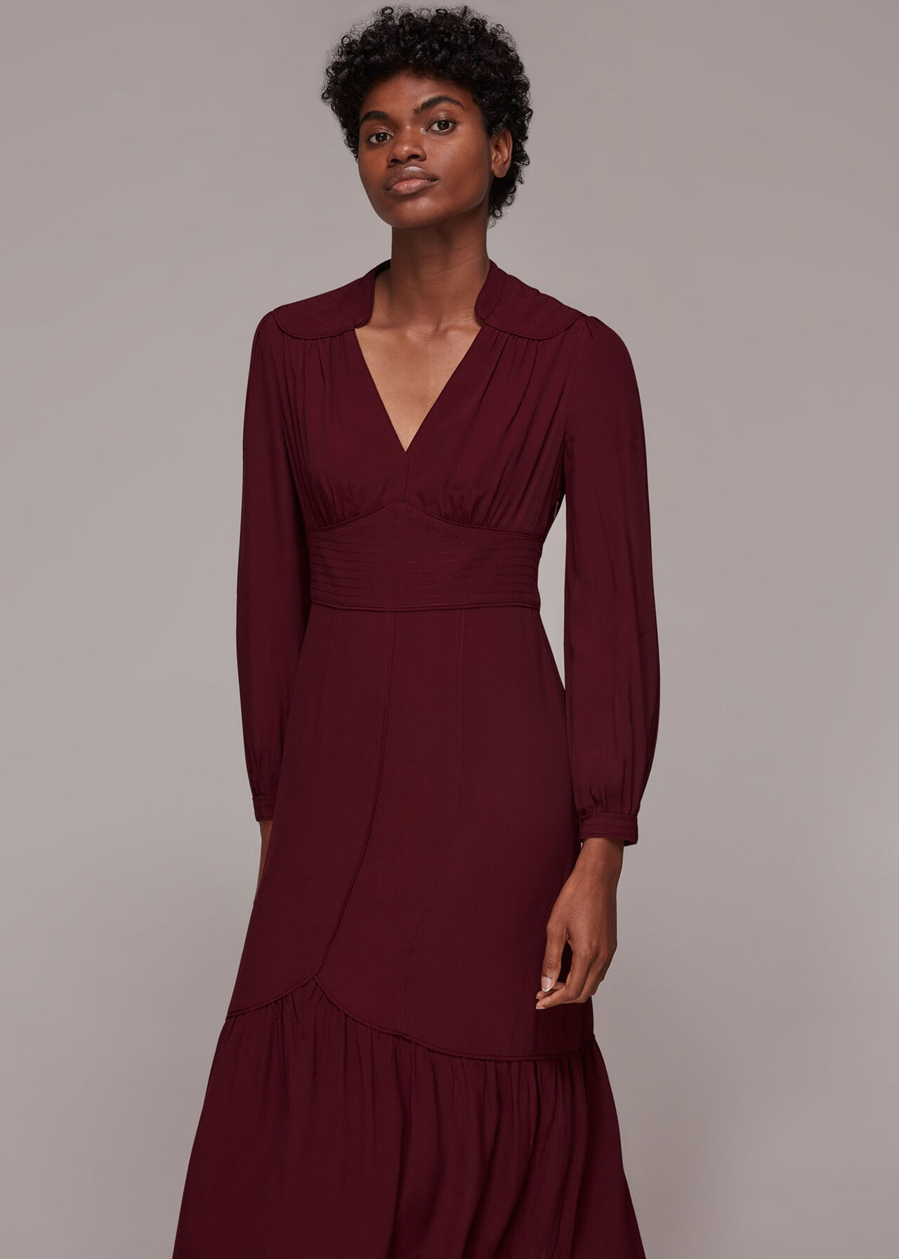 Illustrative example of burgundy midi dress