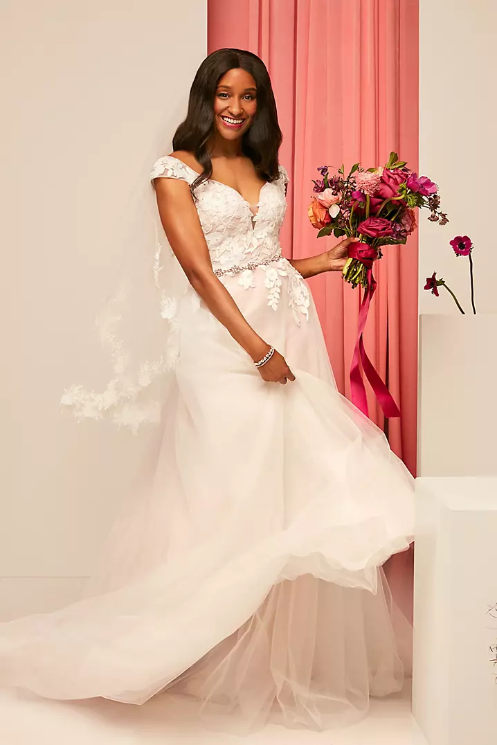 Illustrative example of cap sleeve wedding dress