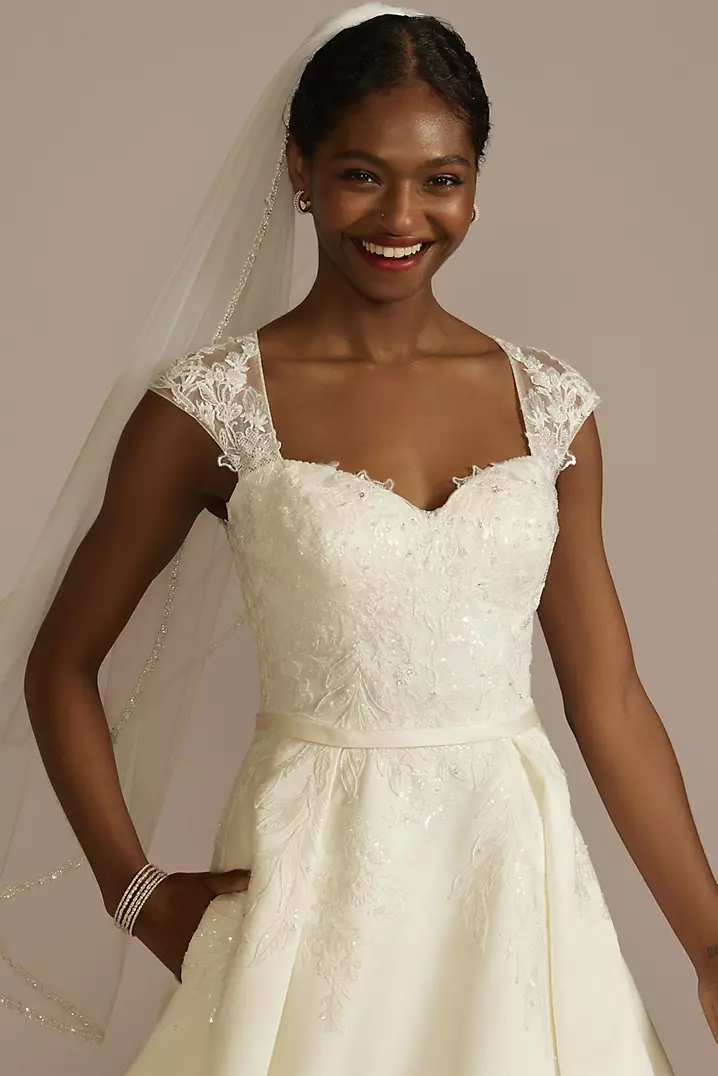 Illustrative example of cap sleeve wedding dress