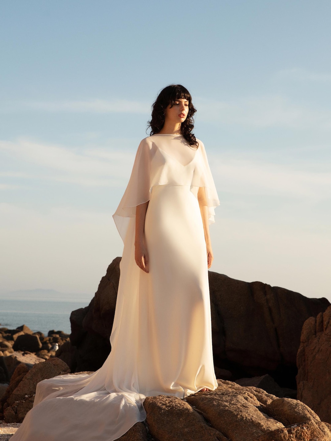 Illustrative example of capelet dress wedding