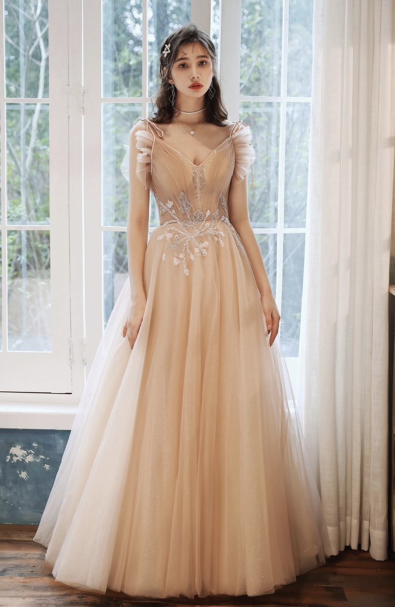 Illustrative example of champagne grad dress