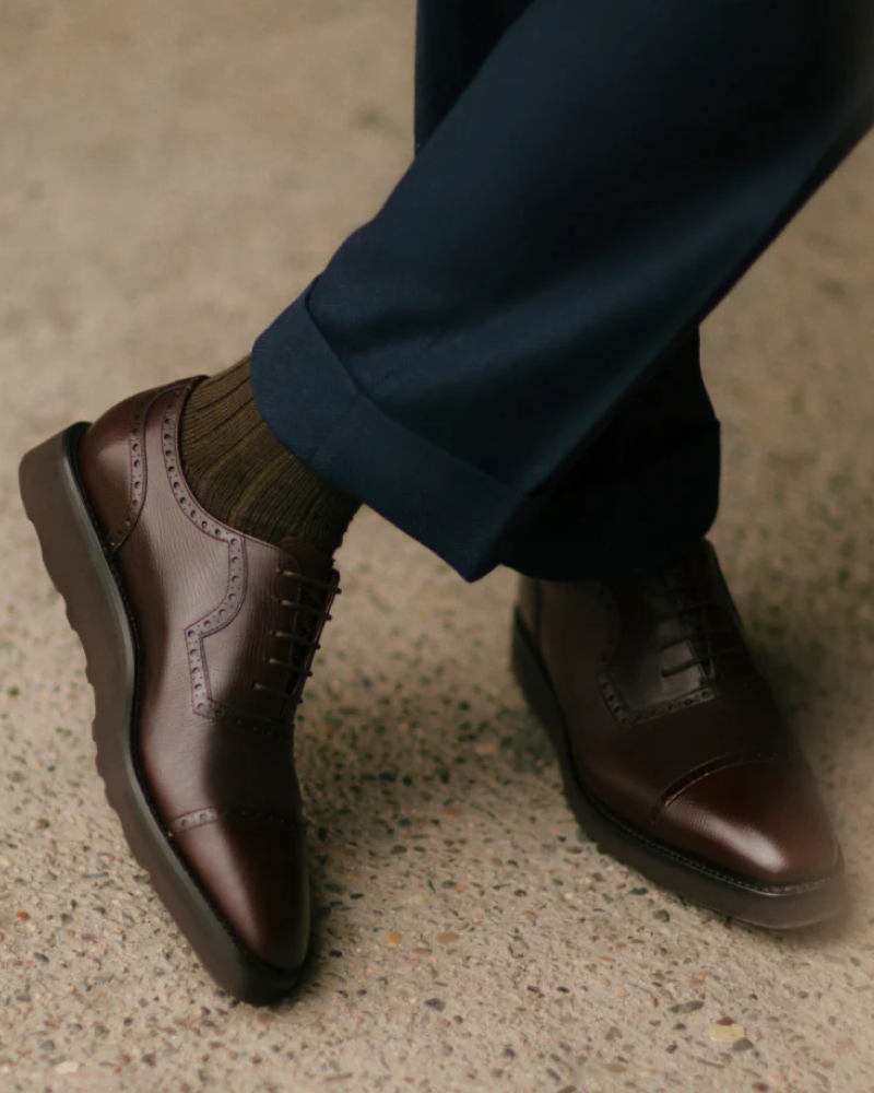 Illustrative example of dark brown dress shoes