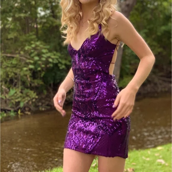 Illustrative example of dark purple homecoming dress