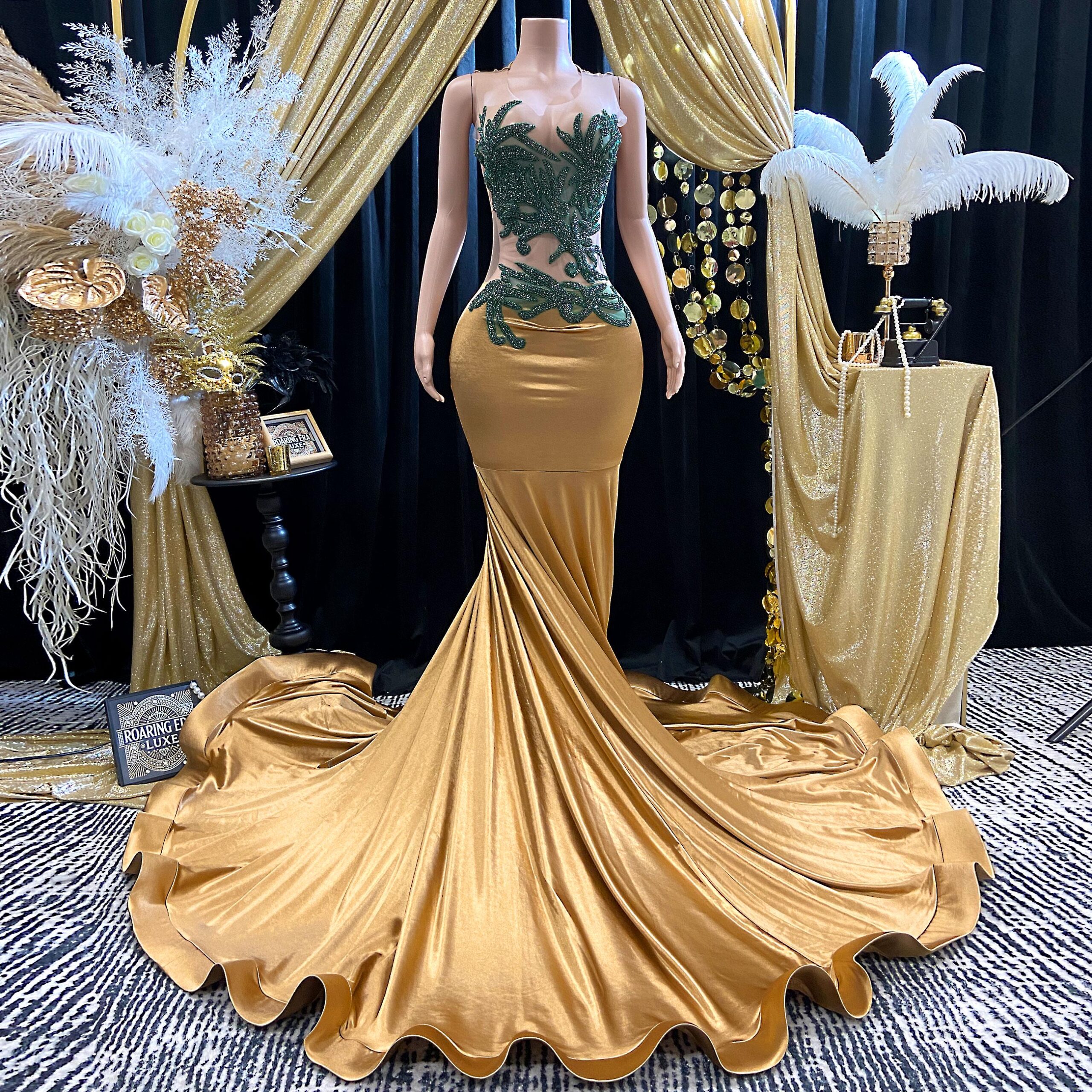 Illustrative example of evening dresses in gold
