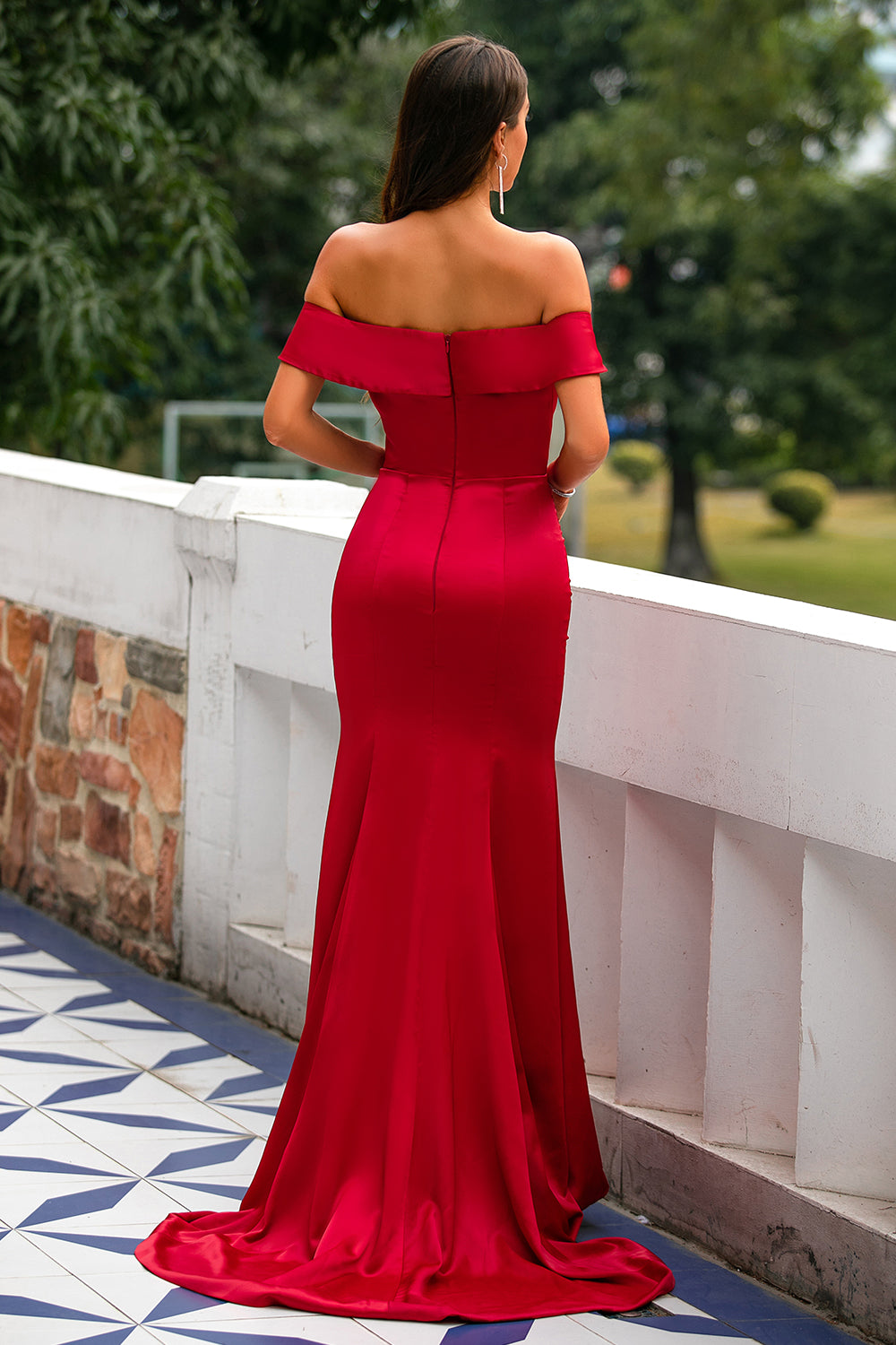 Illustrative example of formal women's red off the shoulder dress for date night