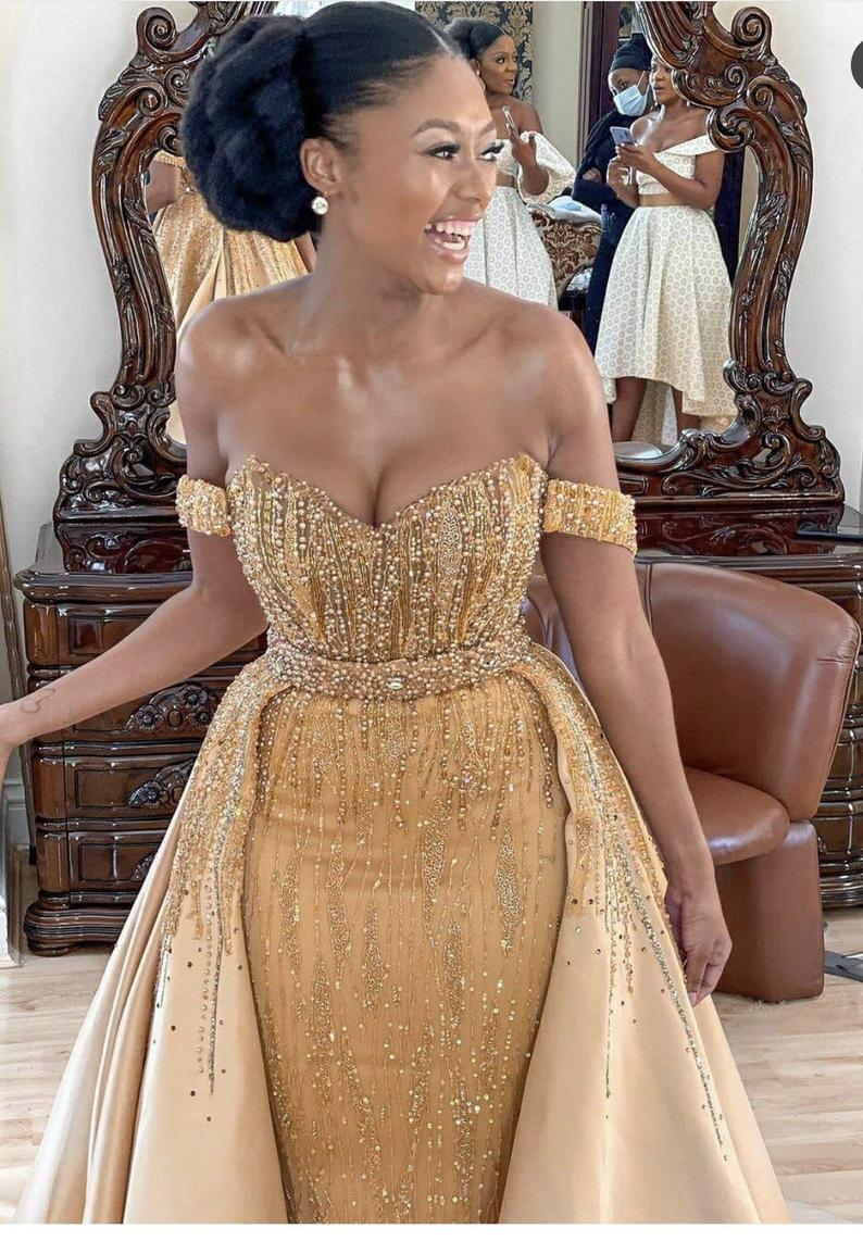 Illustrative example of gold dress long dress