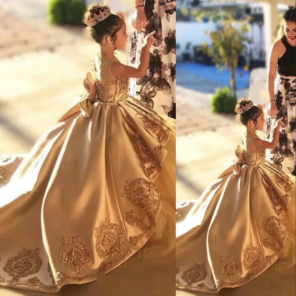 Illustrative example of gold flower girl dresses