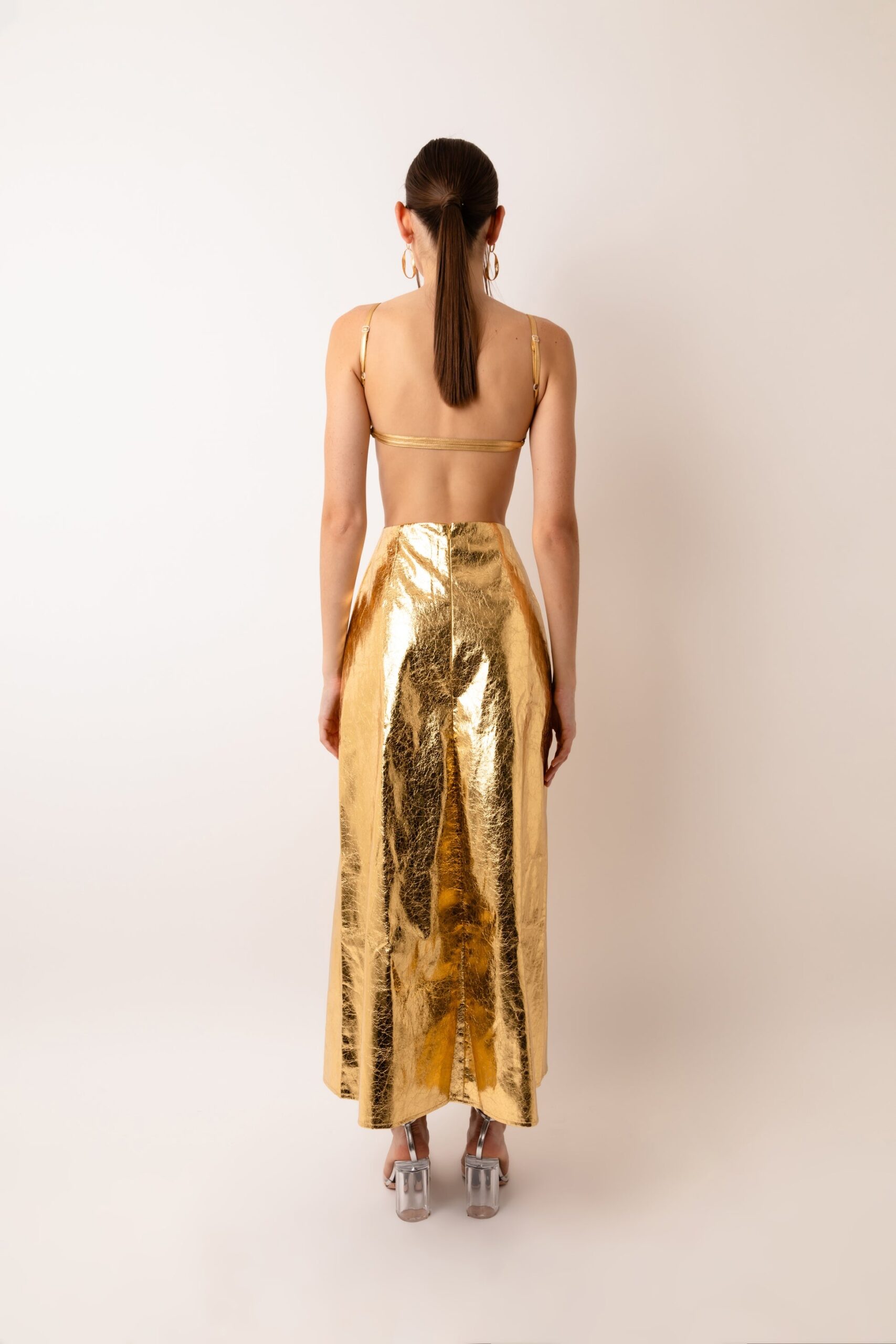 Illustrative example of gold metallic dress