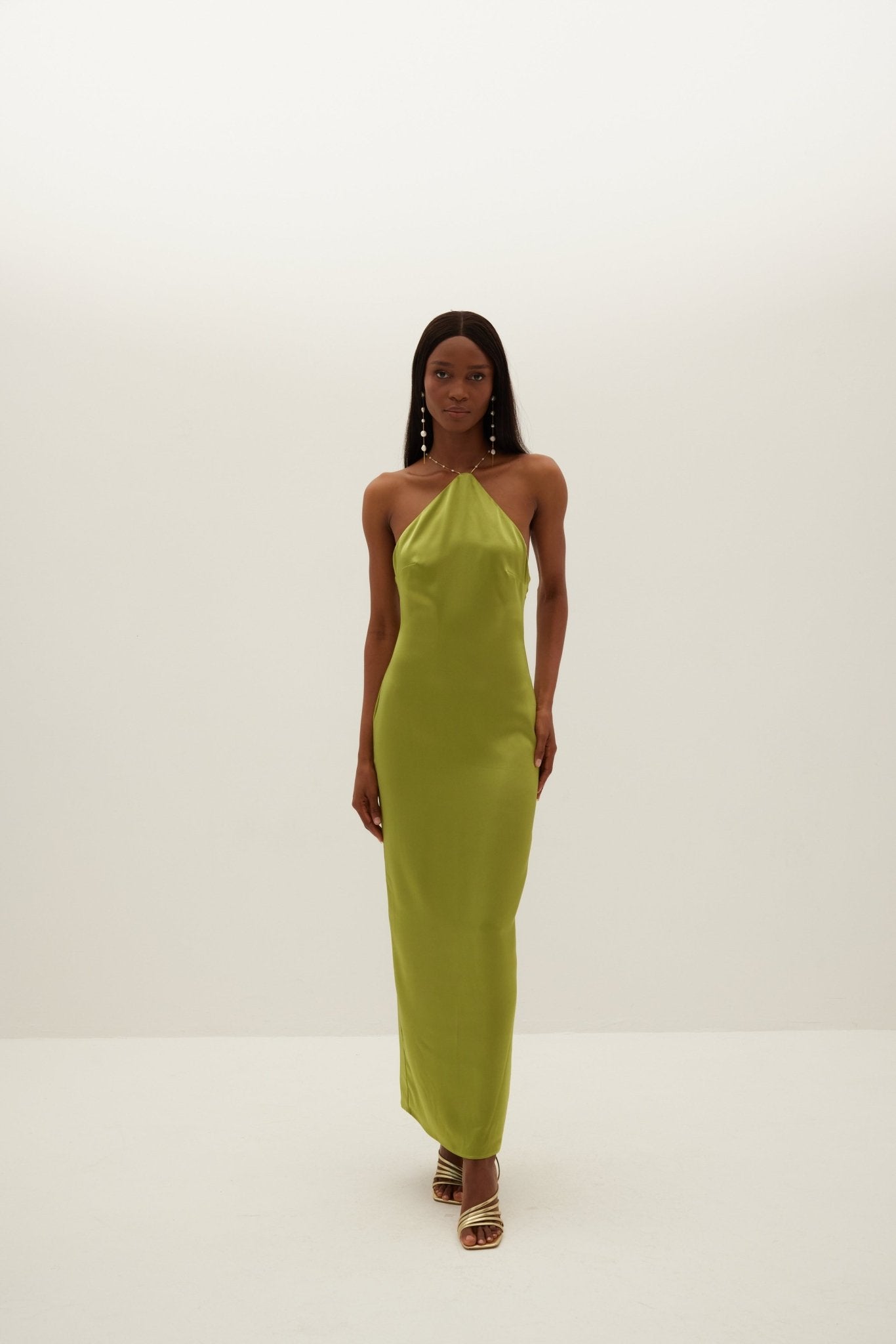 Illustrative example of green halter dress