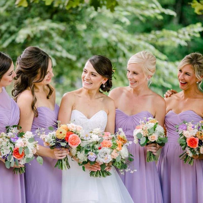 Illustrative example of lavender colour bridesmaid dresses