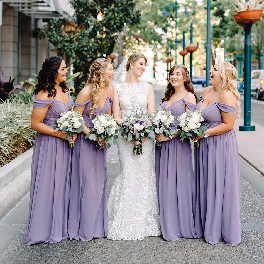 Illustrative example of lavender colour bridesmaid dresses