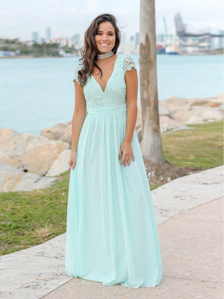 Illustrative example of light blue dress for wedding guest