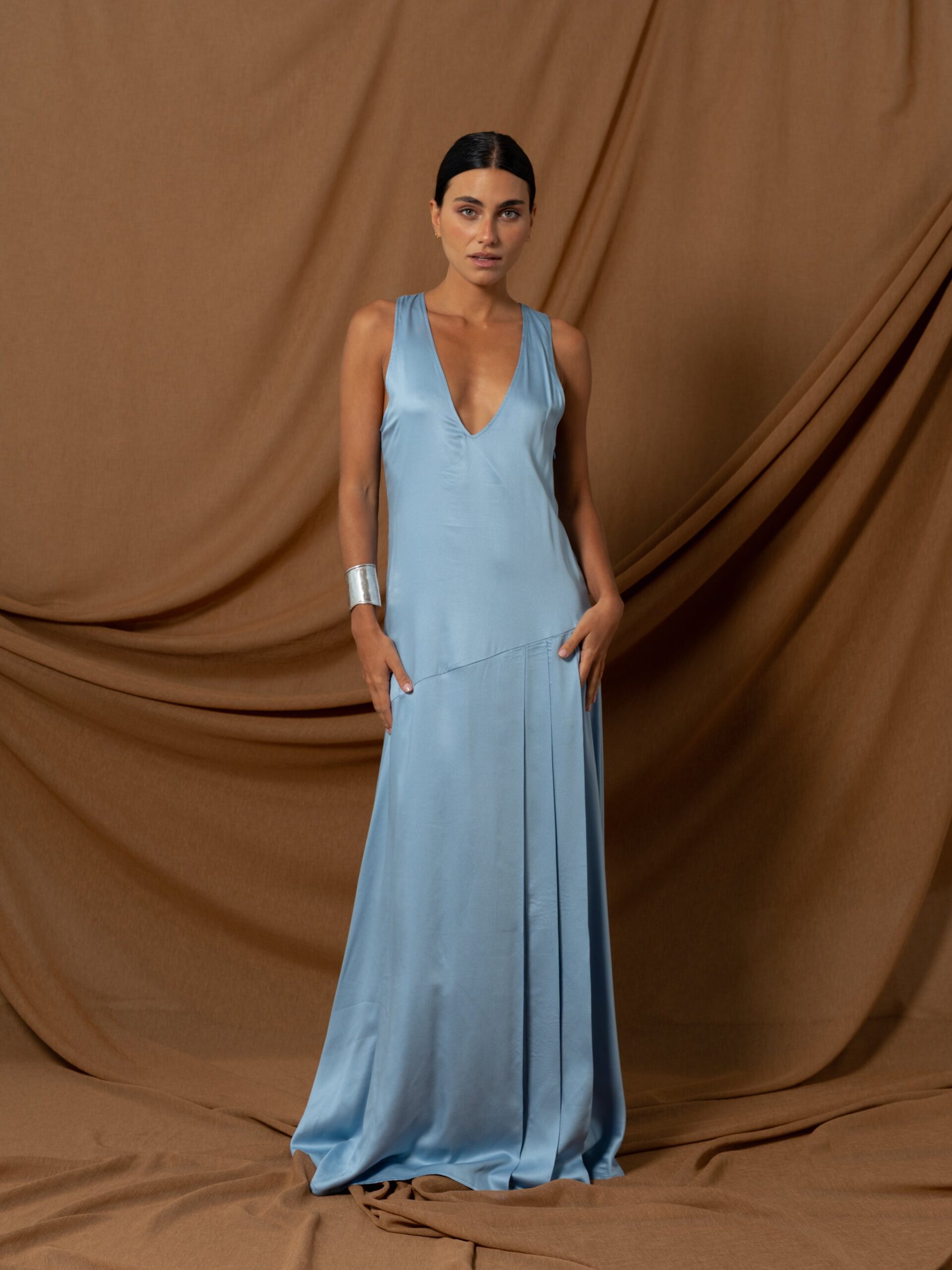 Illustrative example of light blue satin dress