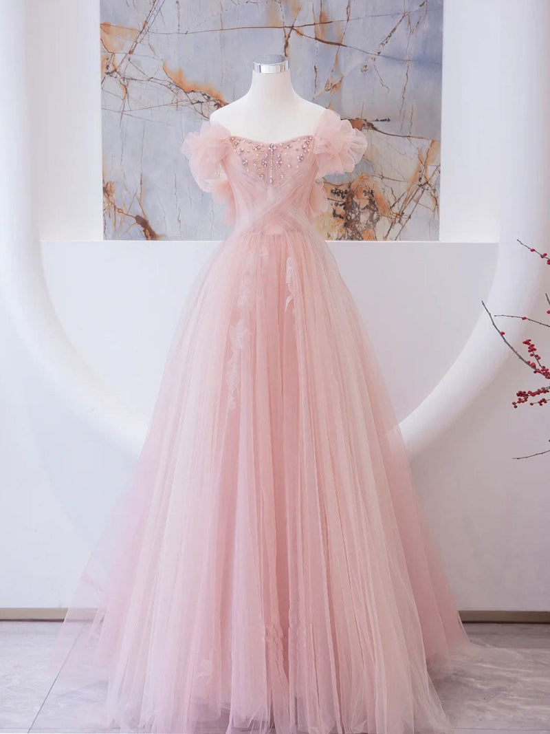 Illustrative example of light pink grad dresses