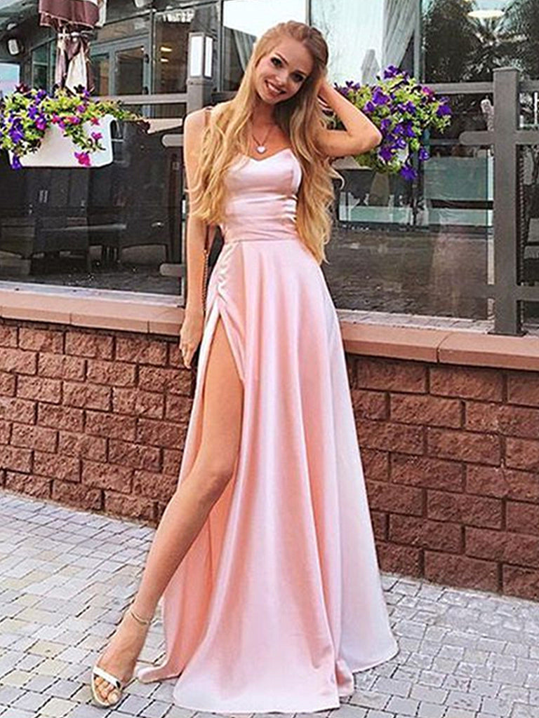 Illustrative example of light pink grad dresses