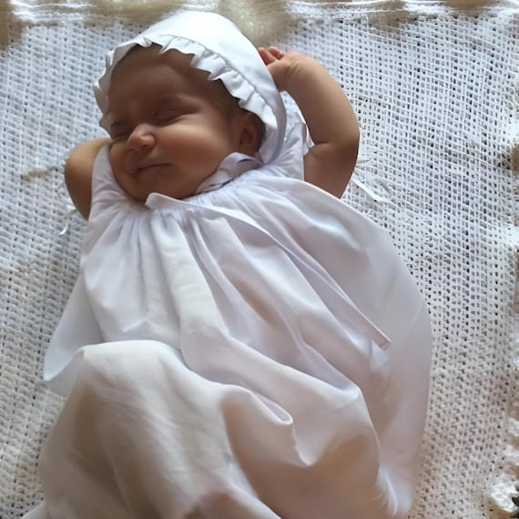 Illustrative example of newborn going home dress