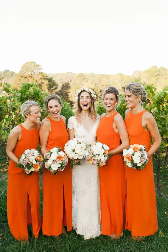 Illustrative example of orange color bridesmaid dresses