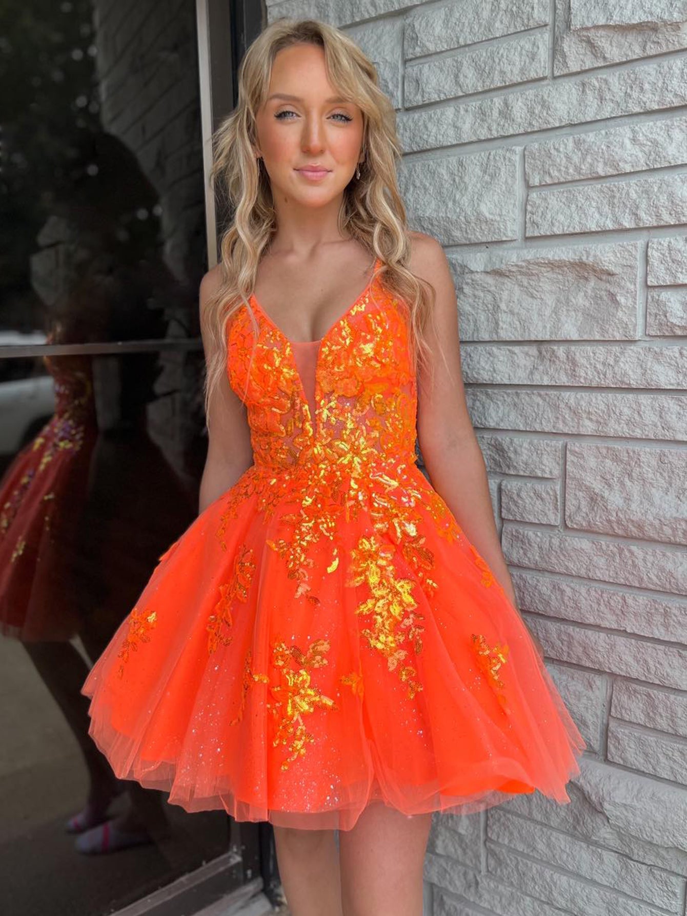 Illustrative example of orange hoco dress