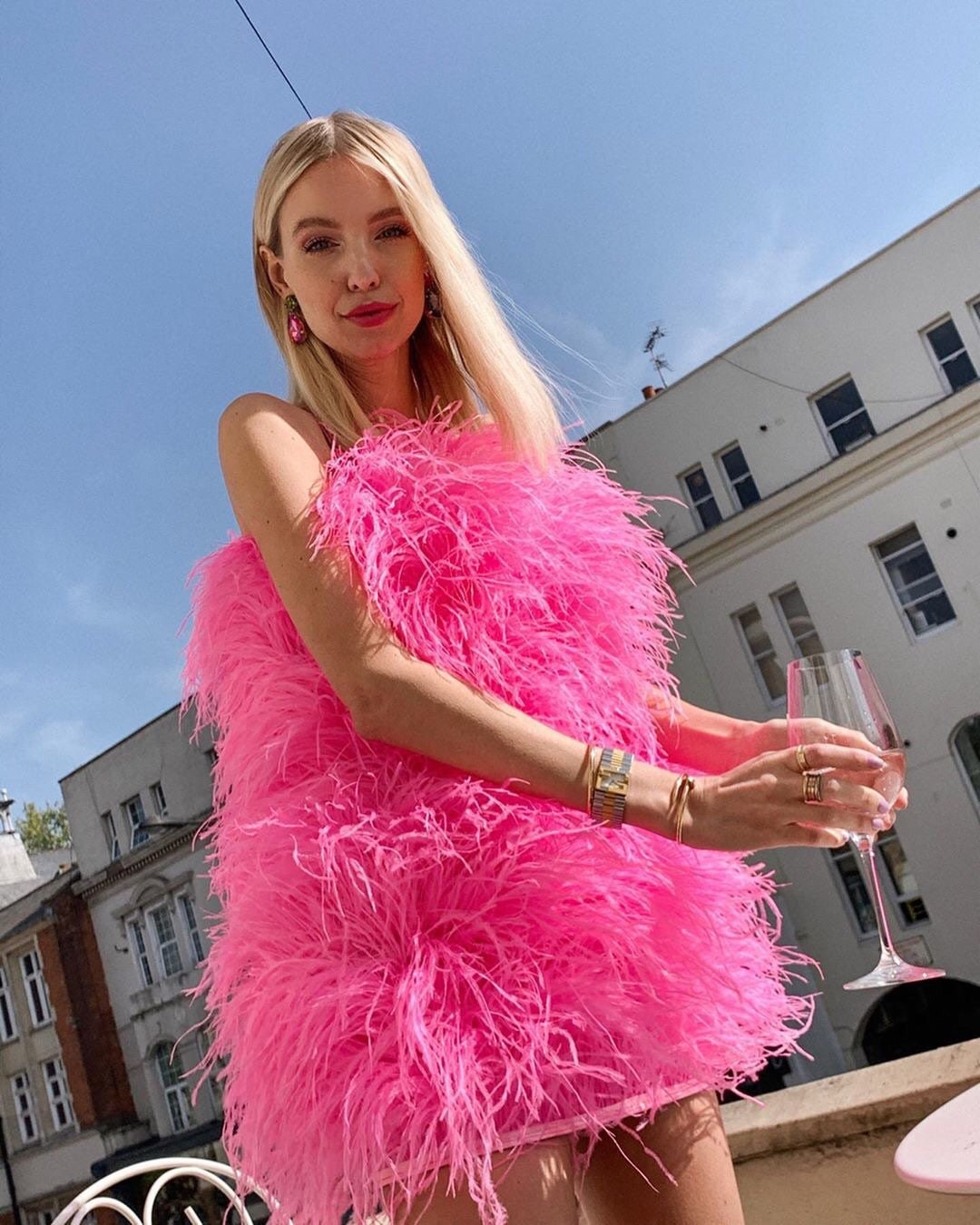 Illustrative example of pink feather dress