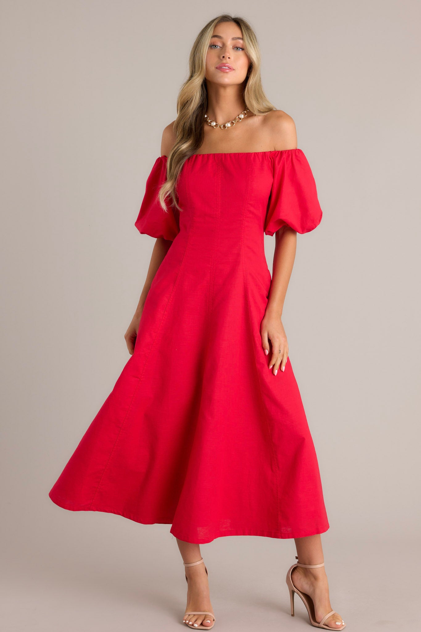 Illustrative example of red off the shoulder dress