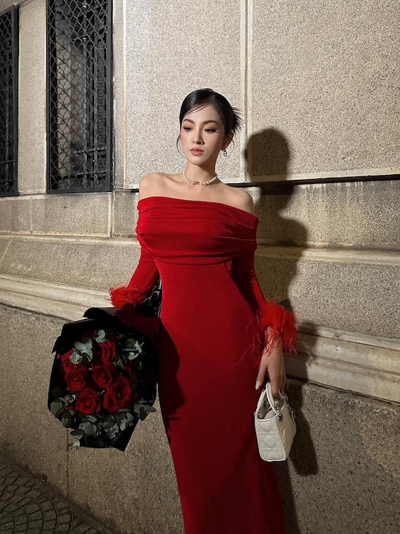 Illustrative example of red off the shoulder dress