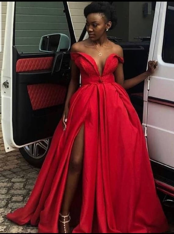 Illustrative example of red wedding guest dress