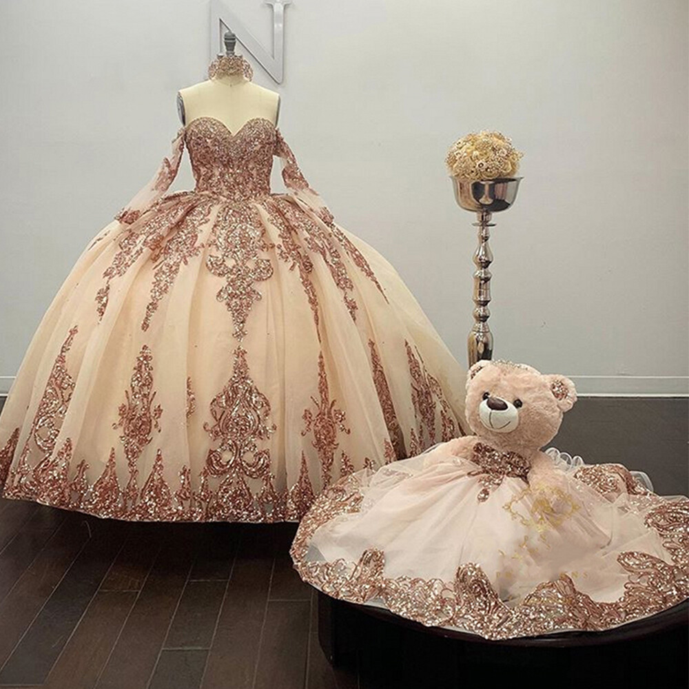 Illustrative example of rose gold quinceanera dresses