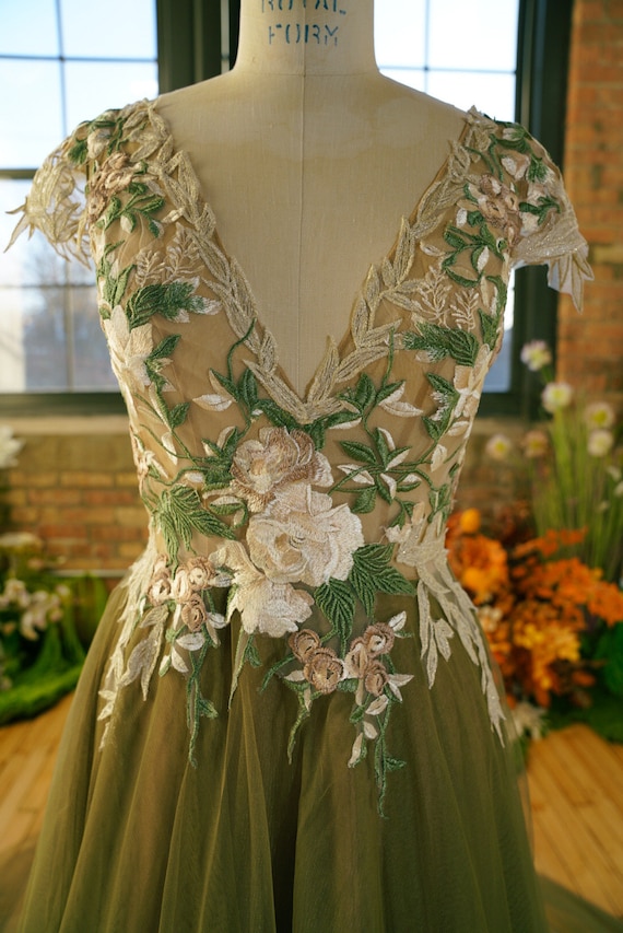 Illustrative example of sage green wedding dress