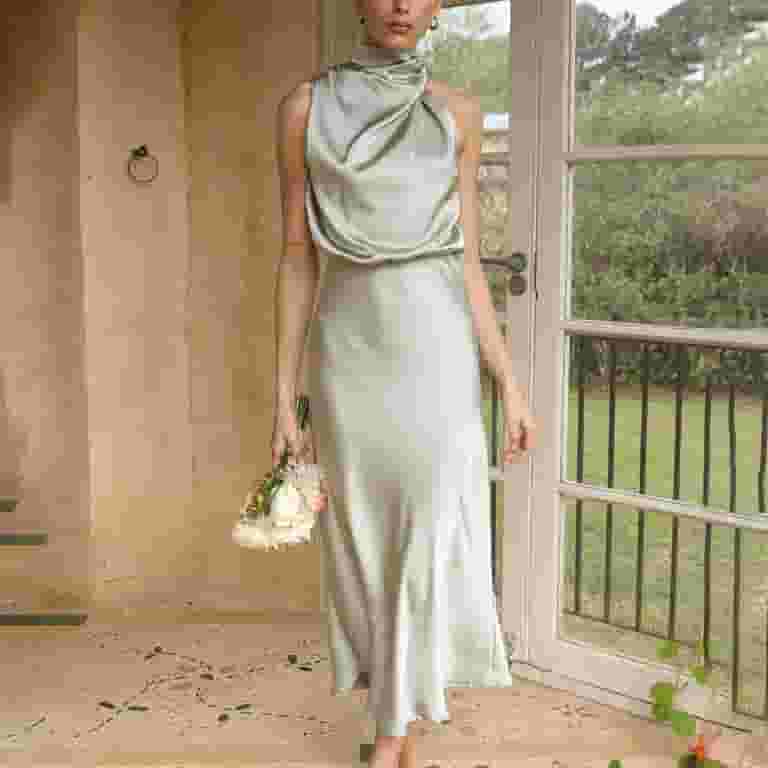 Illustrative example of satin wedding guest dress