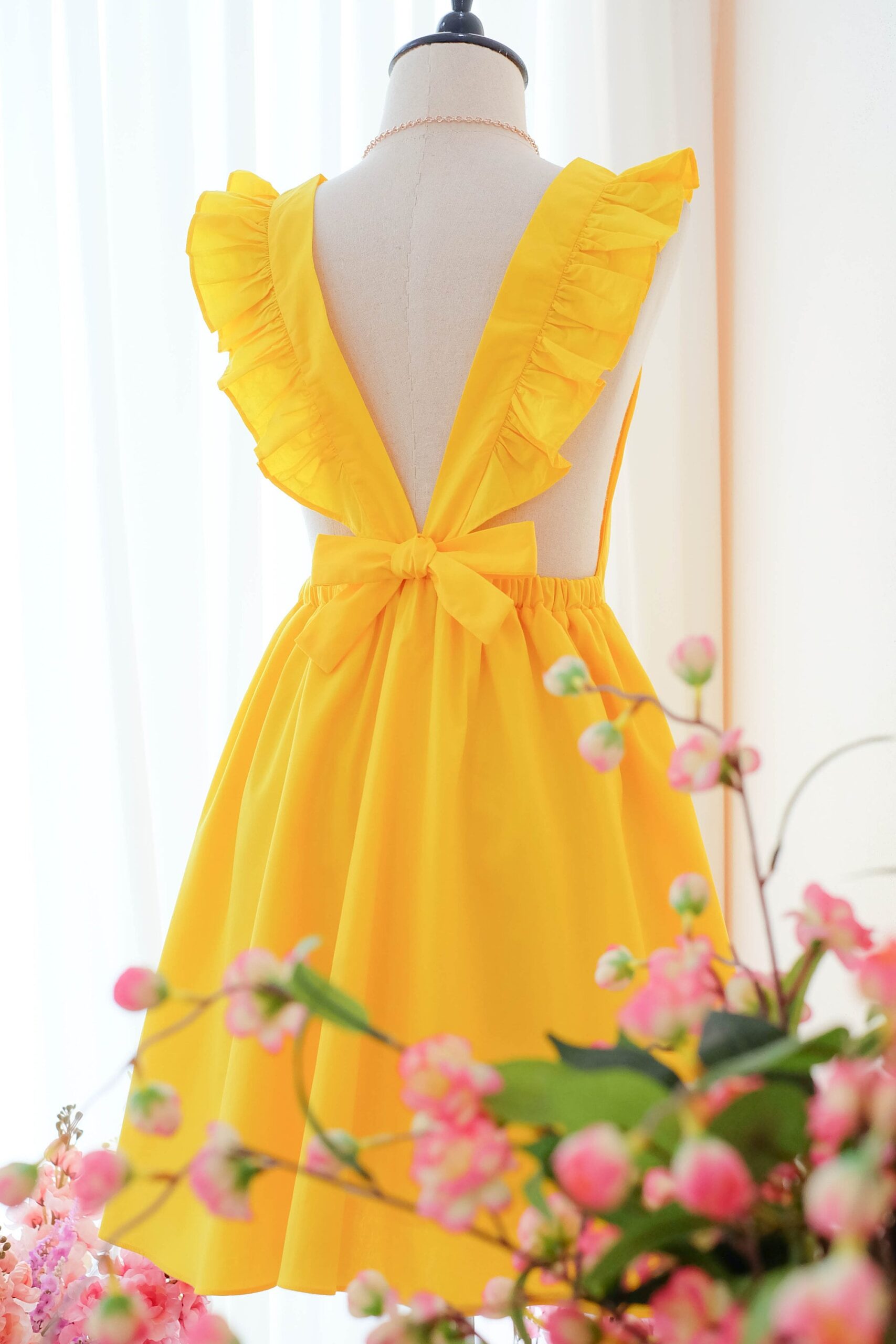 Illustrative example of short yellow dress