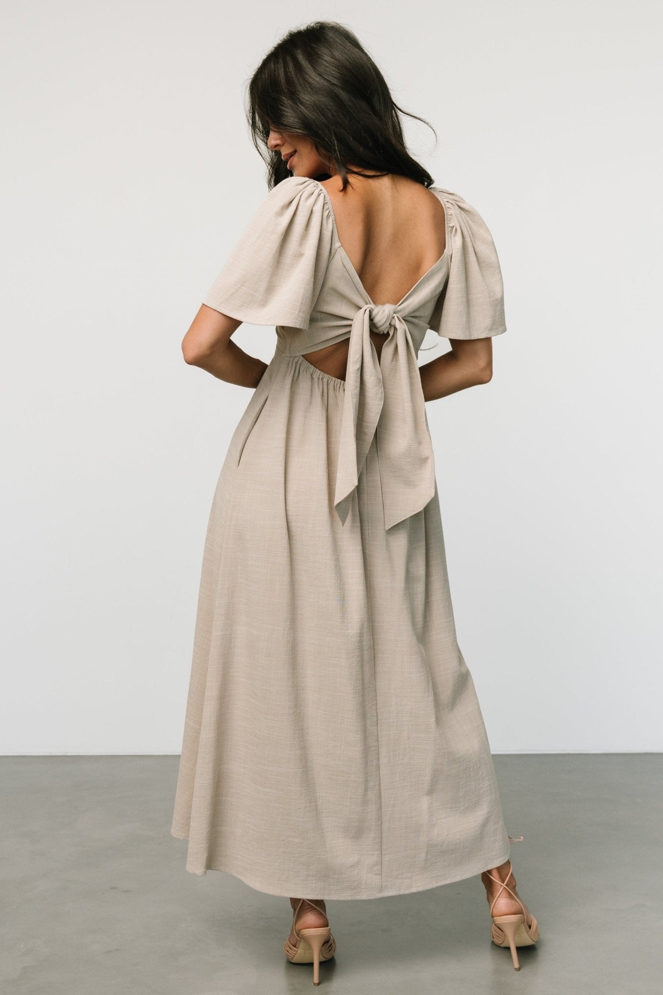 Illustrative example of tie back dress