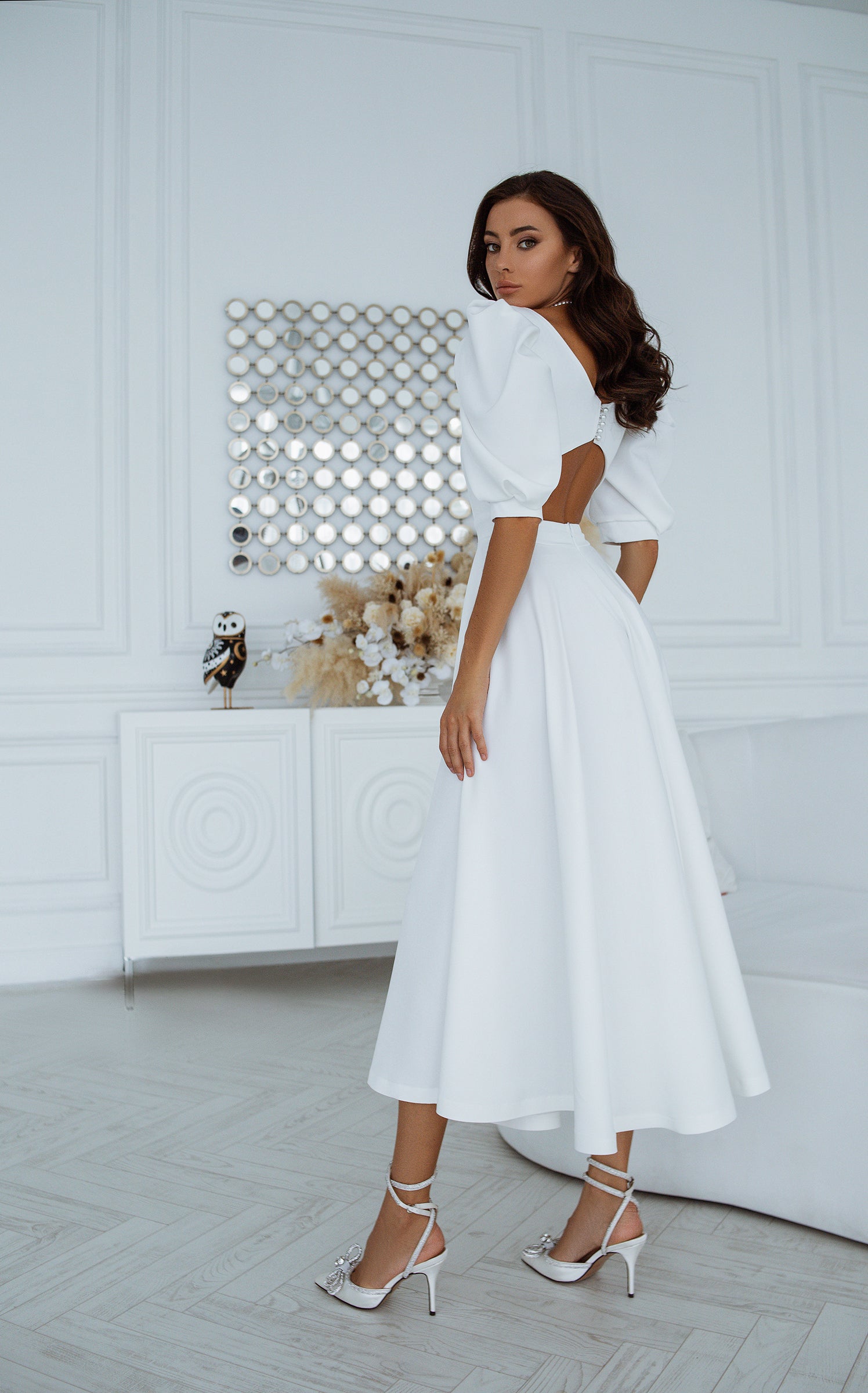 Illustrative example of white puff sleeve dress