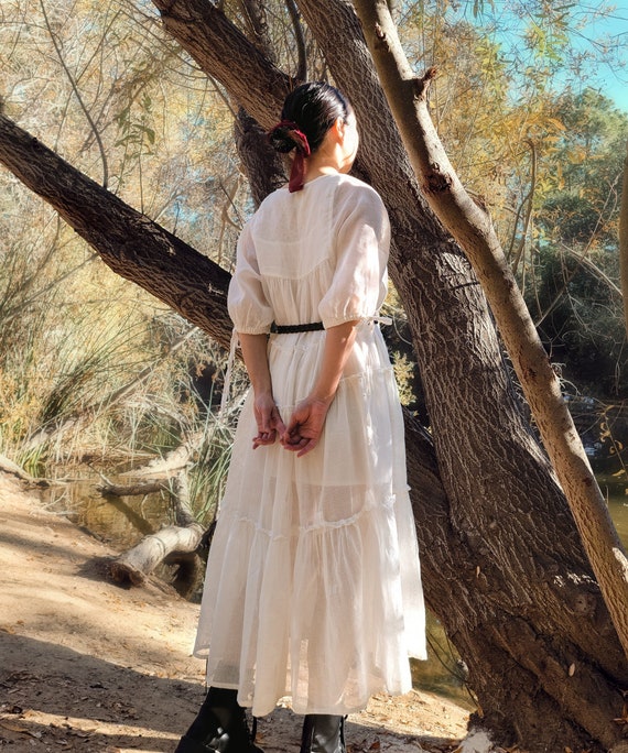 Illustrative example of white puff sleeve dress
