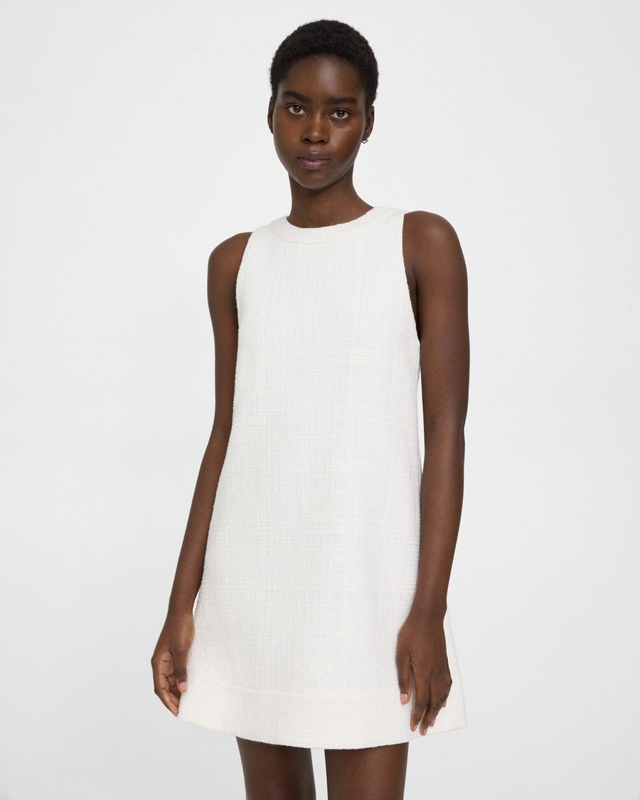 Illustrative example of white tweed dress