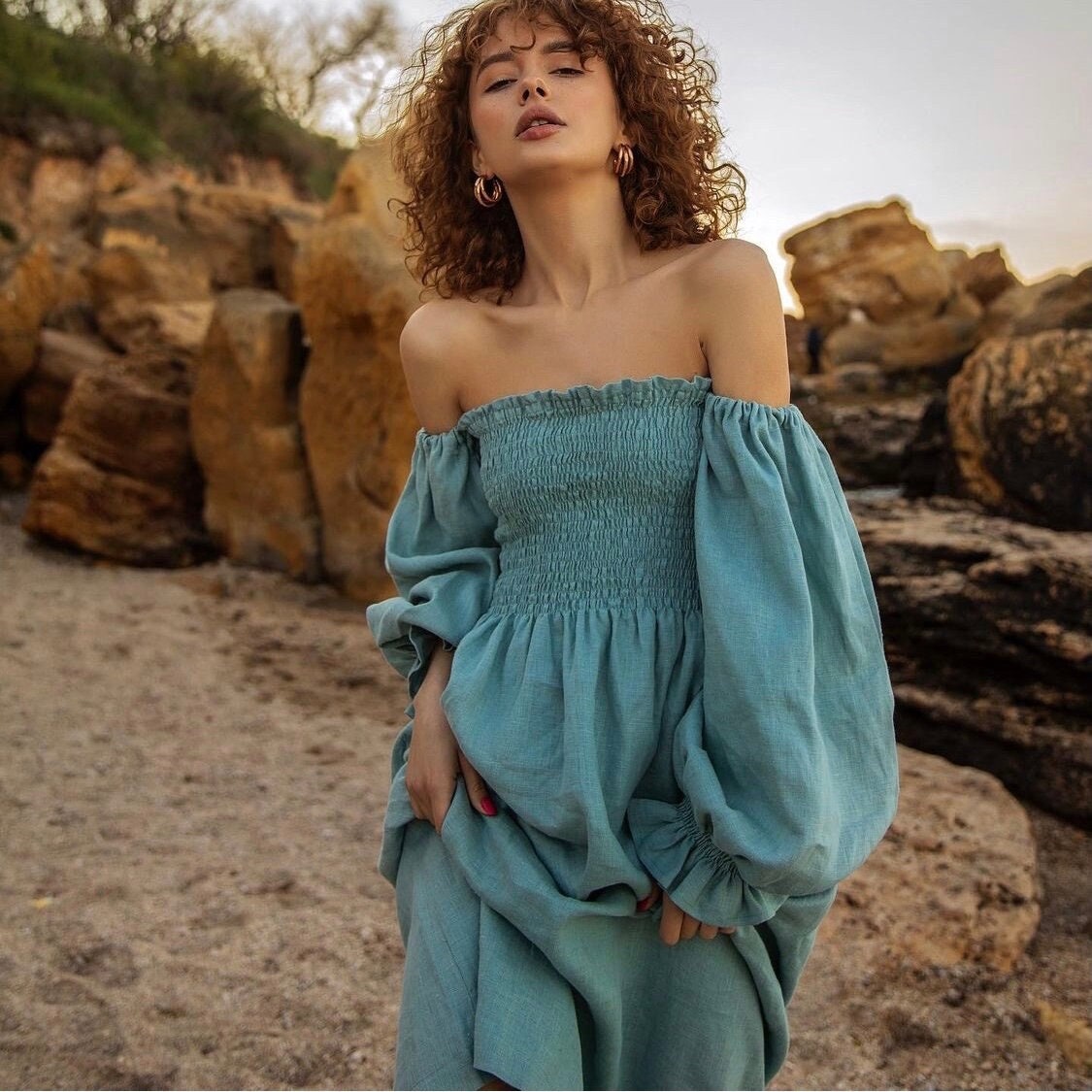 Illustrative example of women's cyan off the shoulder dress