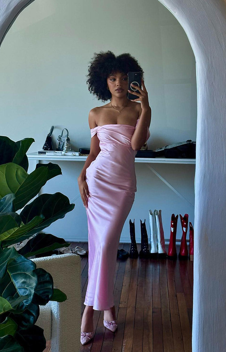 Illustrative example of women's light pink off shoulder dress for the summer