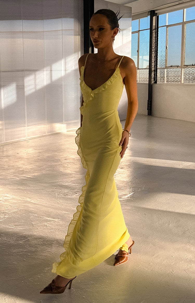 Illustrative example of yellow ruffle dress