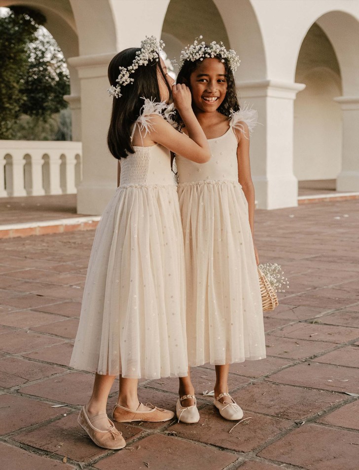 Illustrative example of ivory flower girl dresses from Google Search