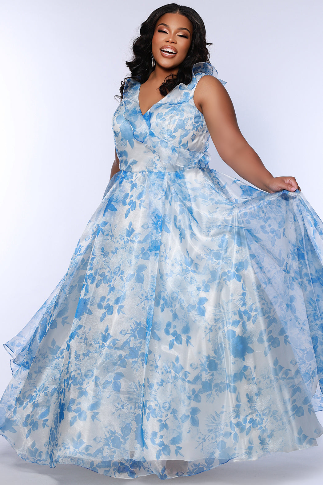 Illustrative example of light blue plus size dress from Google Search